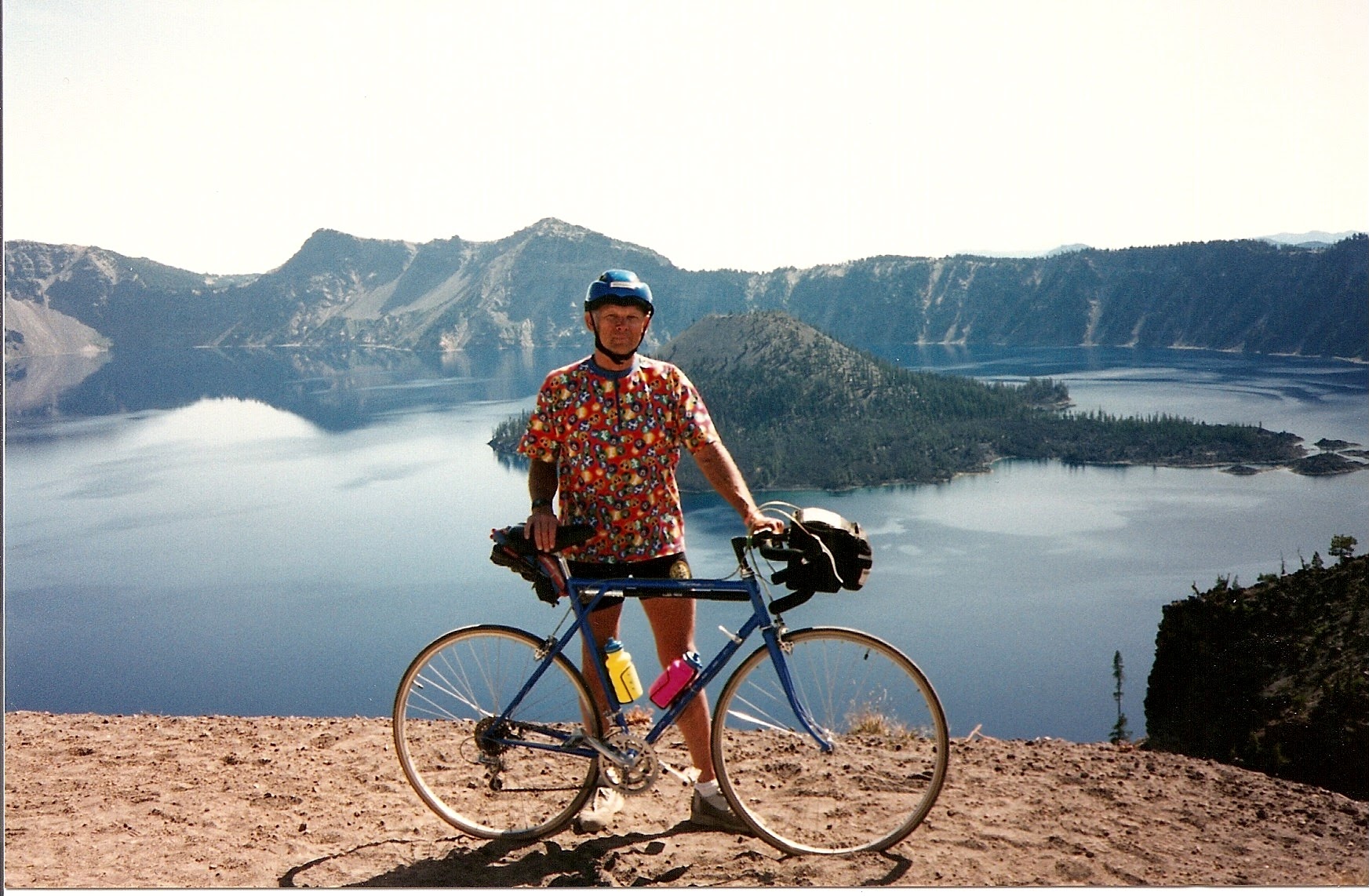 Tom with his bicycle above Crater Lake.