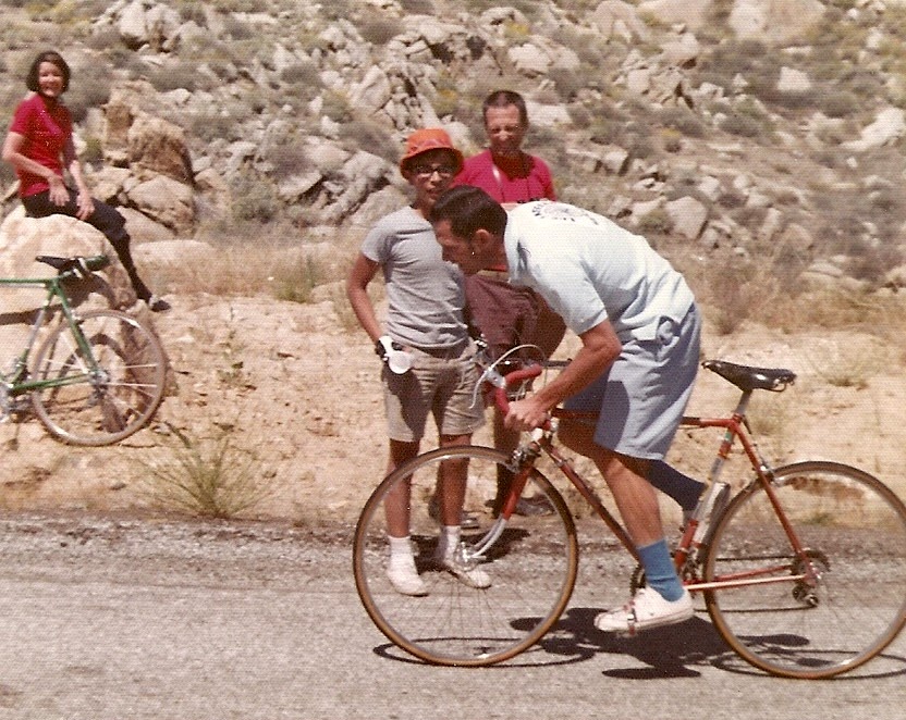 Tom competing in a bicycle hill climb.