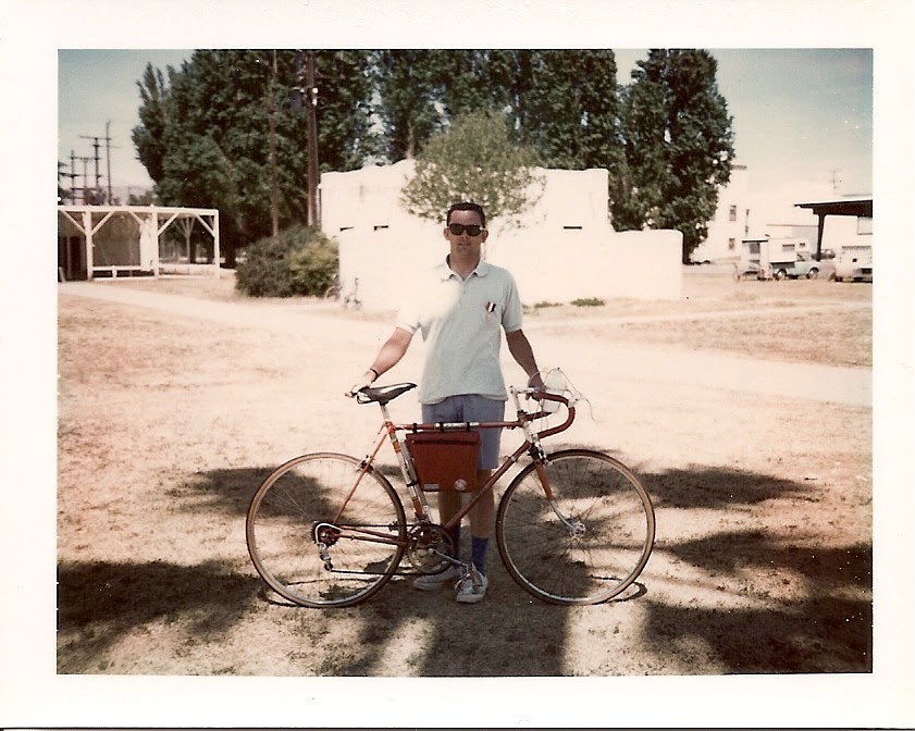 Tom with his bicycle after the hill climb.