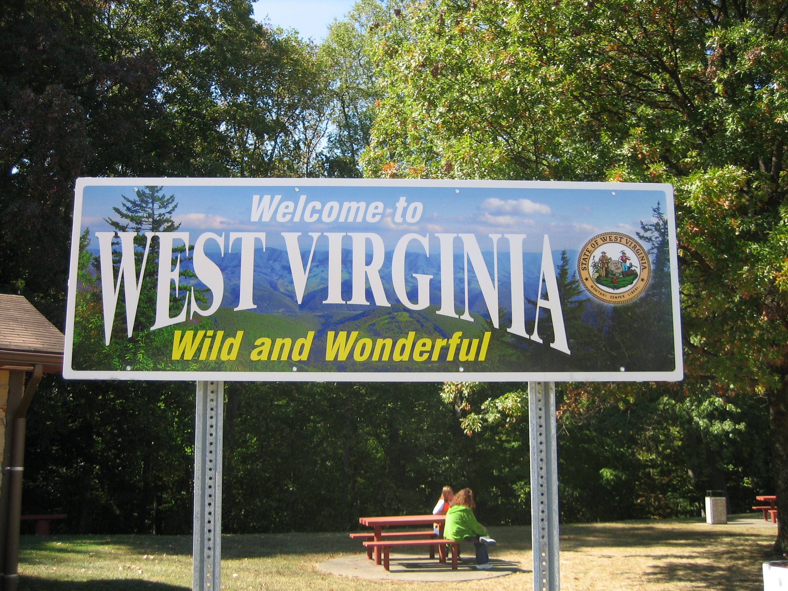 Tom at the West Virginia state sign.