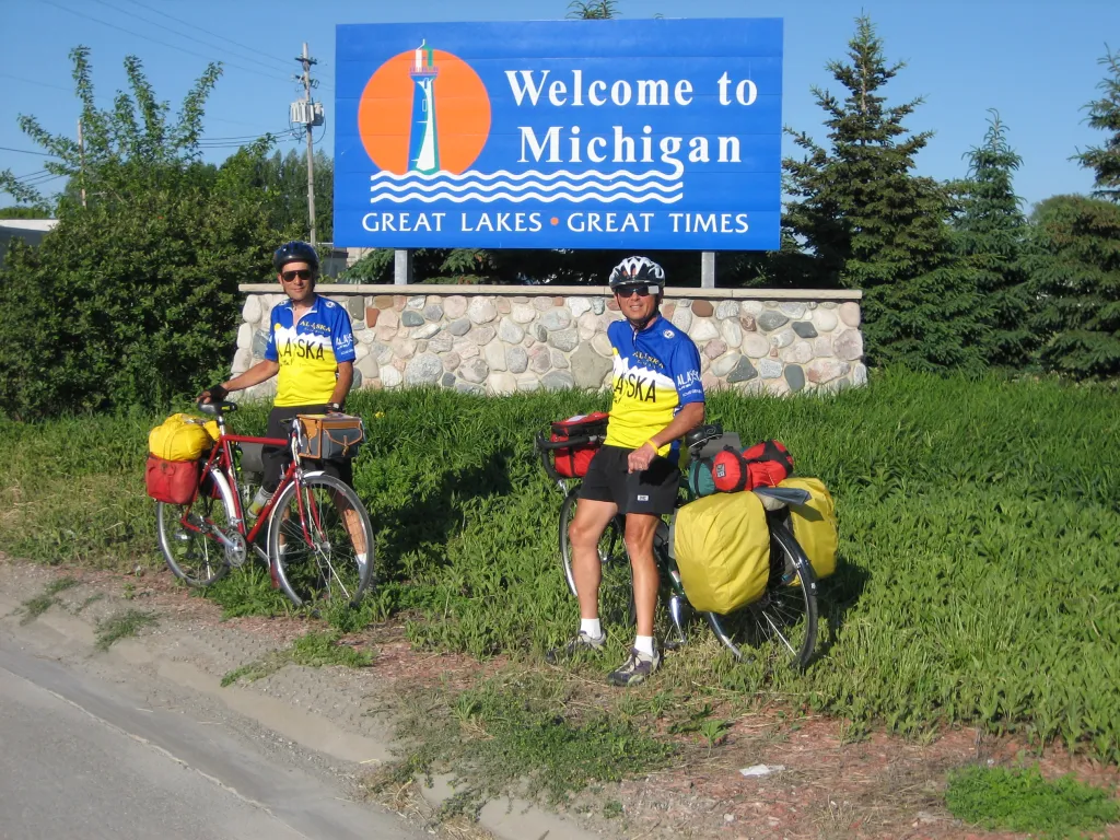 Tom and his riding partner at the Michigan state sign
